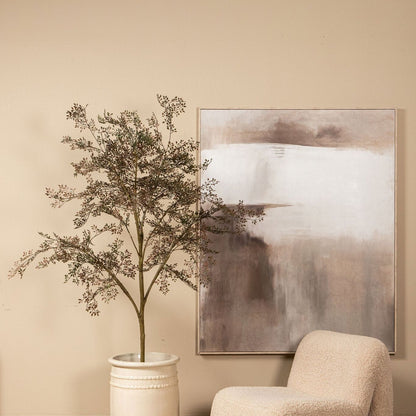 Kunstboom kleinblad van PTMD in een interieur met natuurlijke tinten