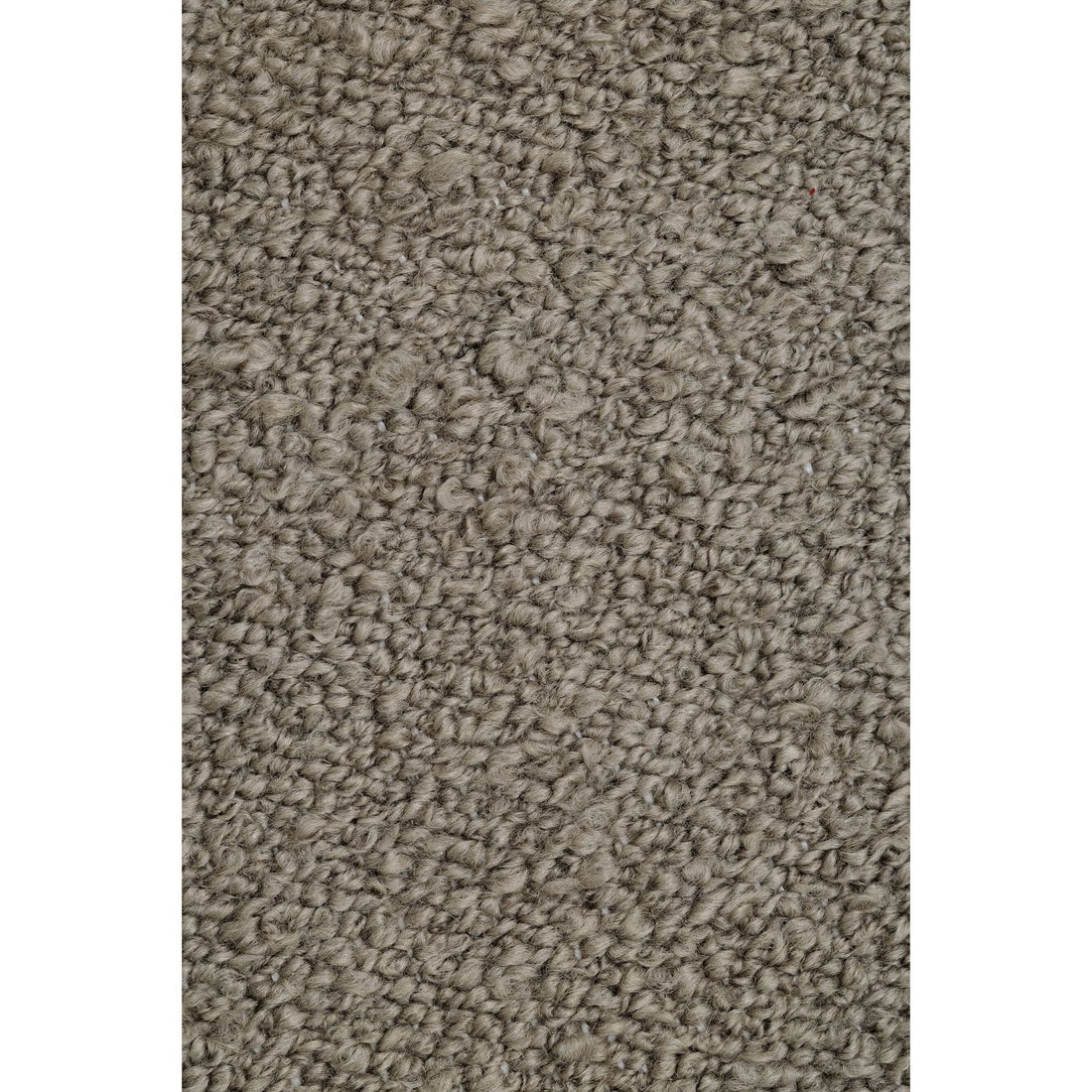 Detail van het taupe Noble vloerkleed van MUST Living met gemeleerde structuur